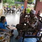 Pelf busy interviewing a senior fisherman