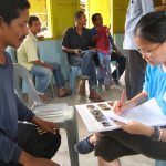 Si En, student volunteer at work